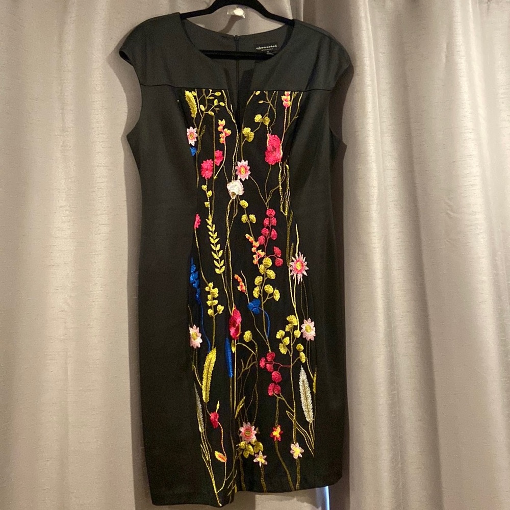 Black dress with beautiful embroidered flowers.